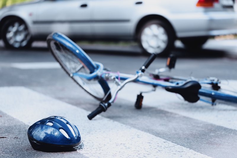 A bike and helmet lying on the road after an accident in Montgomery.