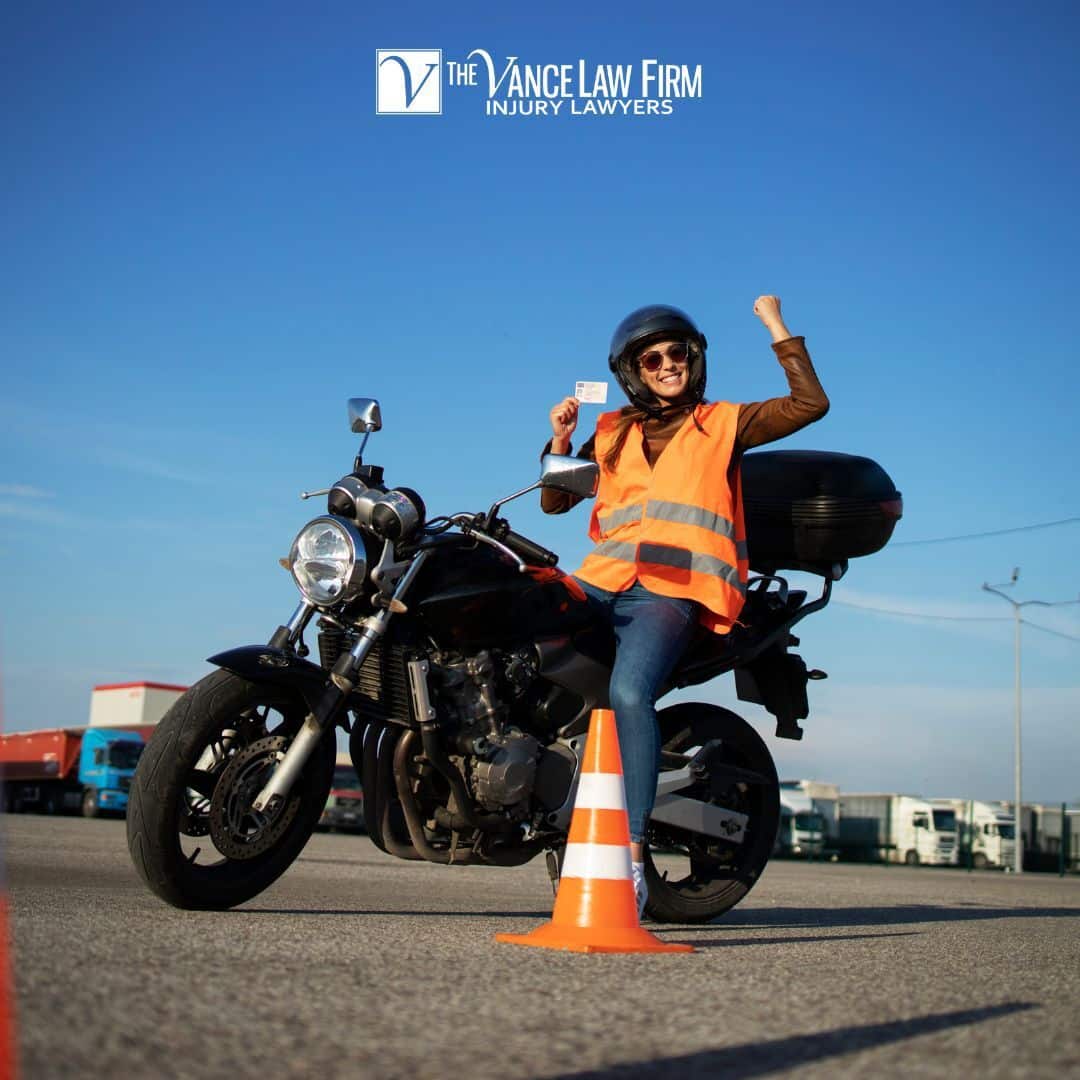 Image of a man on a motorcycle.